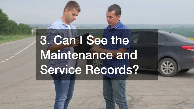 car seller showing the buyer the car maintenance record